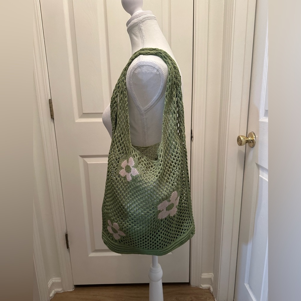 Green and cream crochet tote with flower detail. NWOT